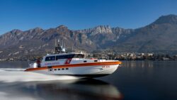 Italian coastguard vessel speeds through the water