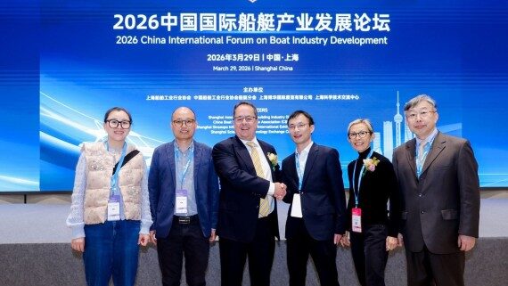 Group of business people - two shaking hands