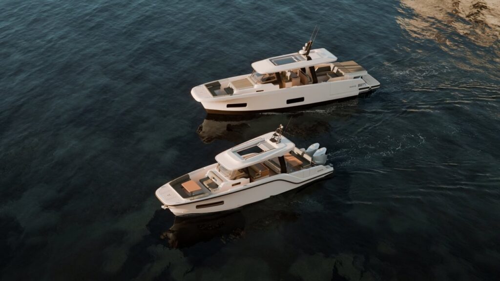 Aerial view of Two Aiata white motorboats