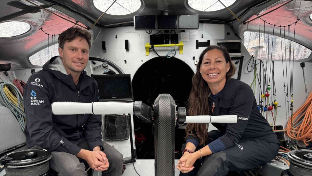 Lincoln Dews and Leah Sweet inside Oliver Heer Ocean Racing IMOCA