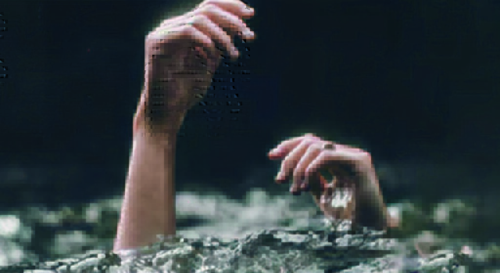 Person with only hands above water