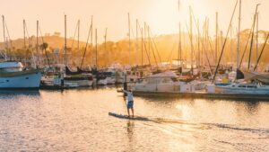 Paddleboarder in UK at sunset